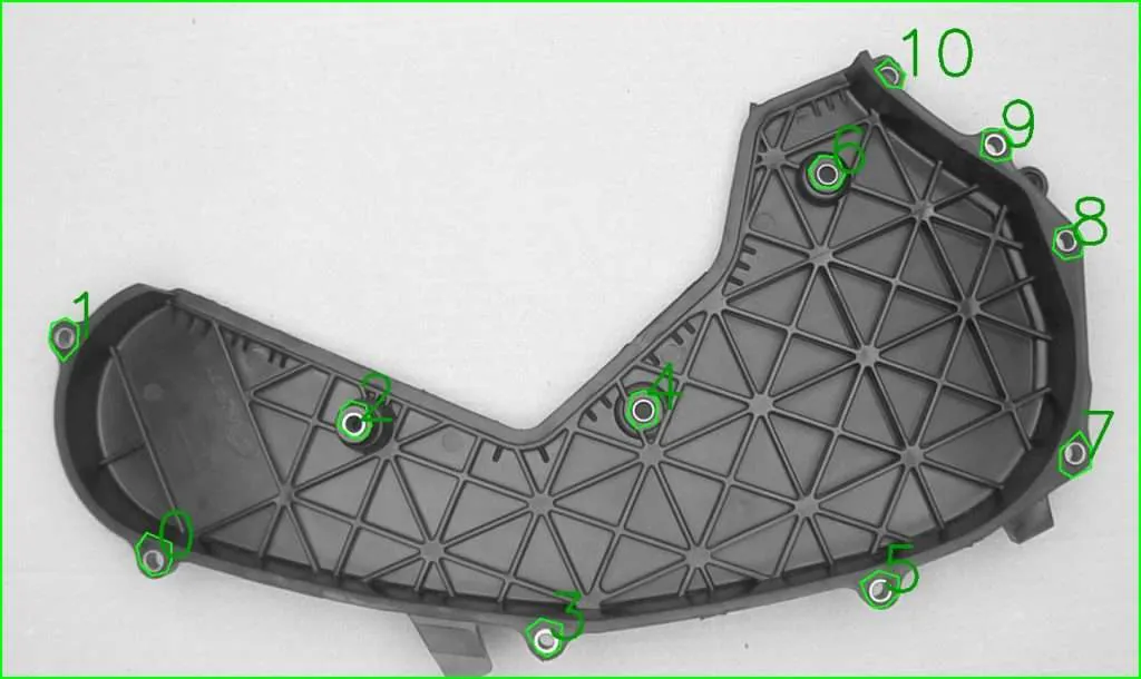 AI computer vision inspecting injection molded plastic parts on a production line